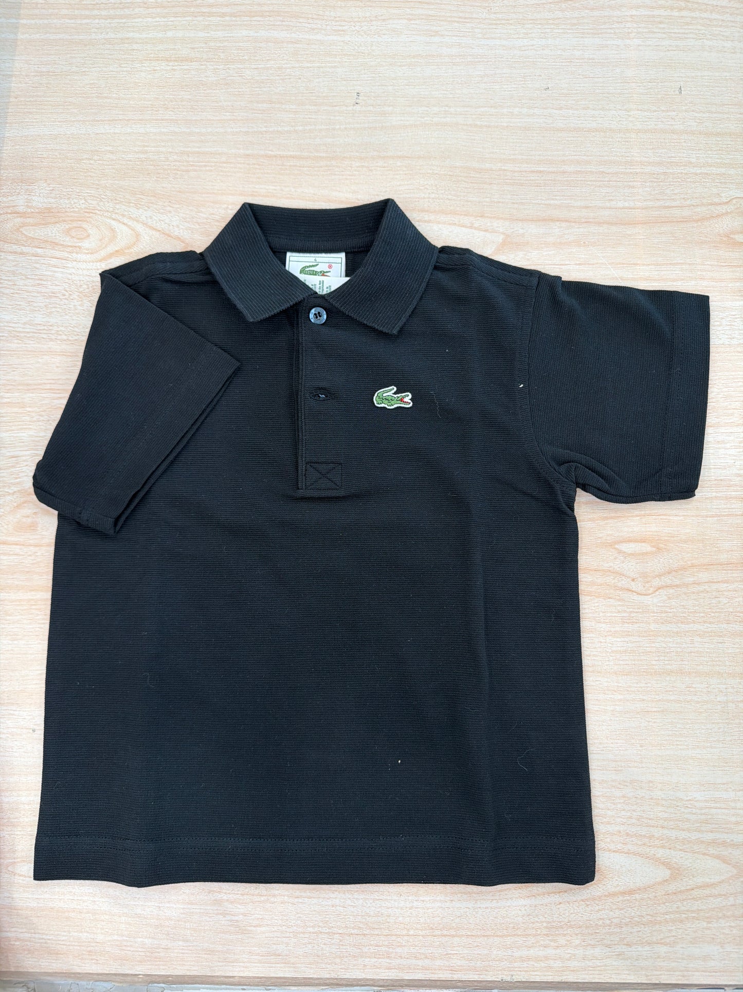 Polo Lacoste in cotone mezza manica con bottoncini e logo ricamato lateralmente unisex
