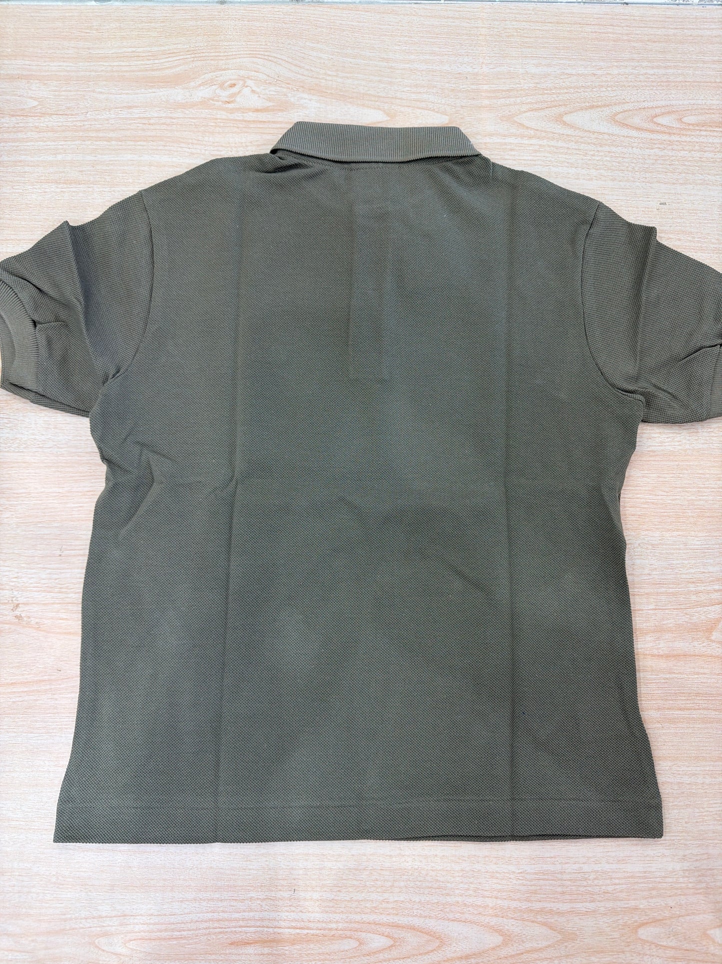 Polo Lacoste in cotone mezza manica con bottoncini e logo ricamato lateralmente unisex