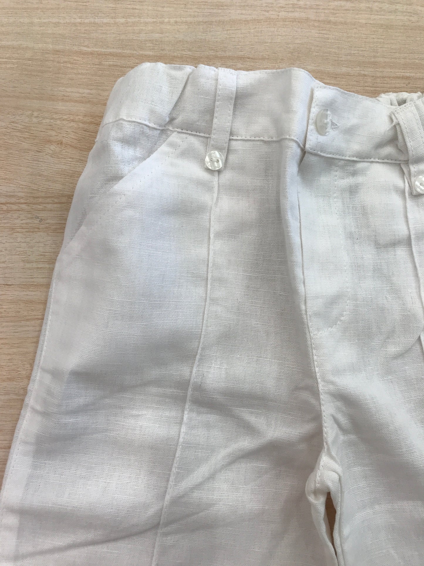Pantalone Coccodè in lino bianco con tasche laterali con elastico in vita