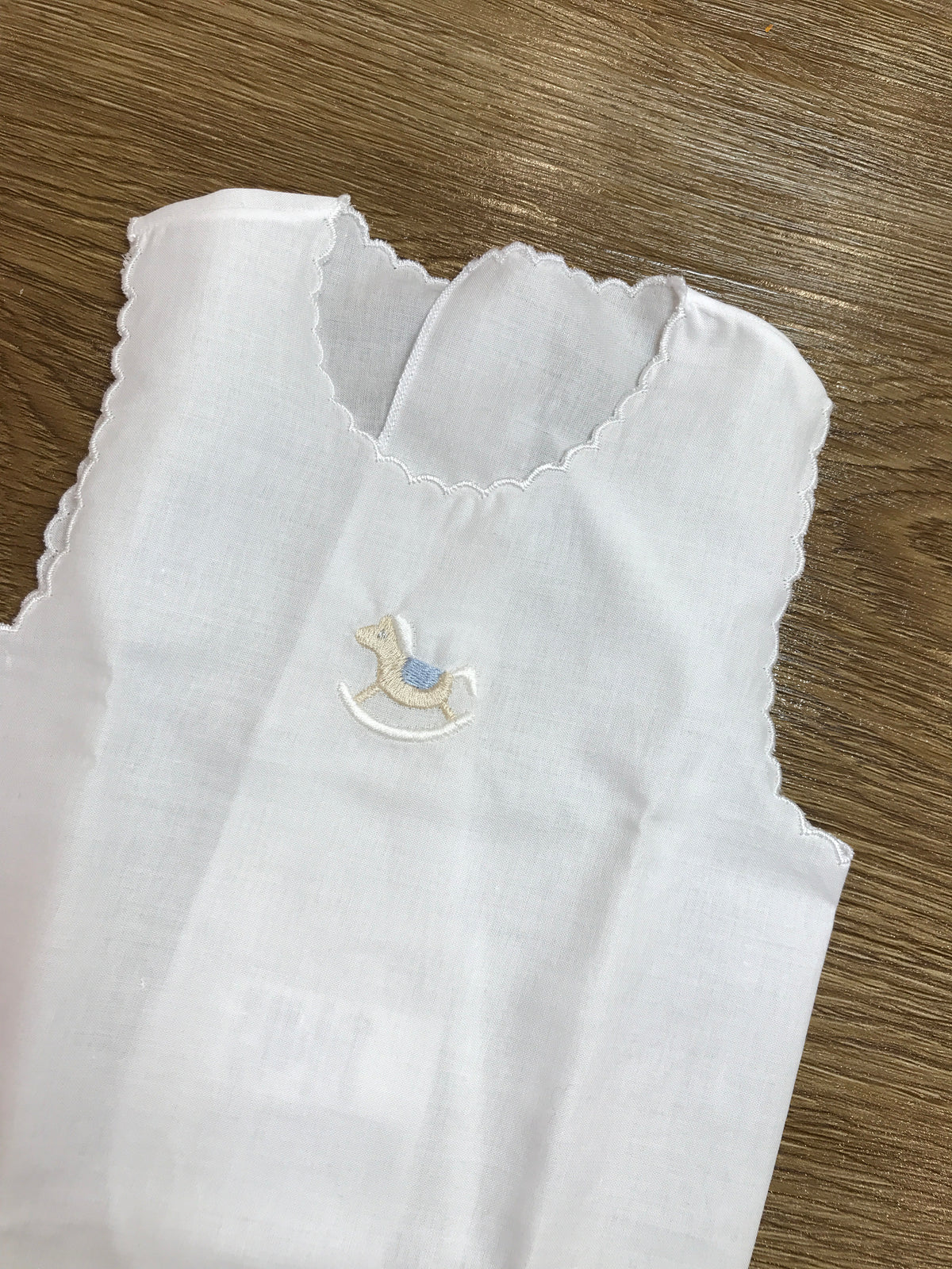 Camicino Coccodè in cotone smanicato con cavallo a dondolo