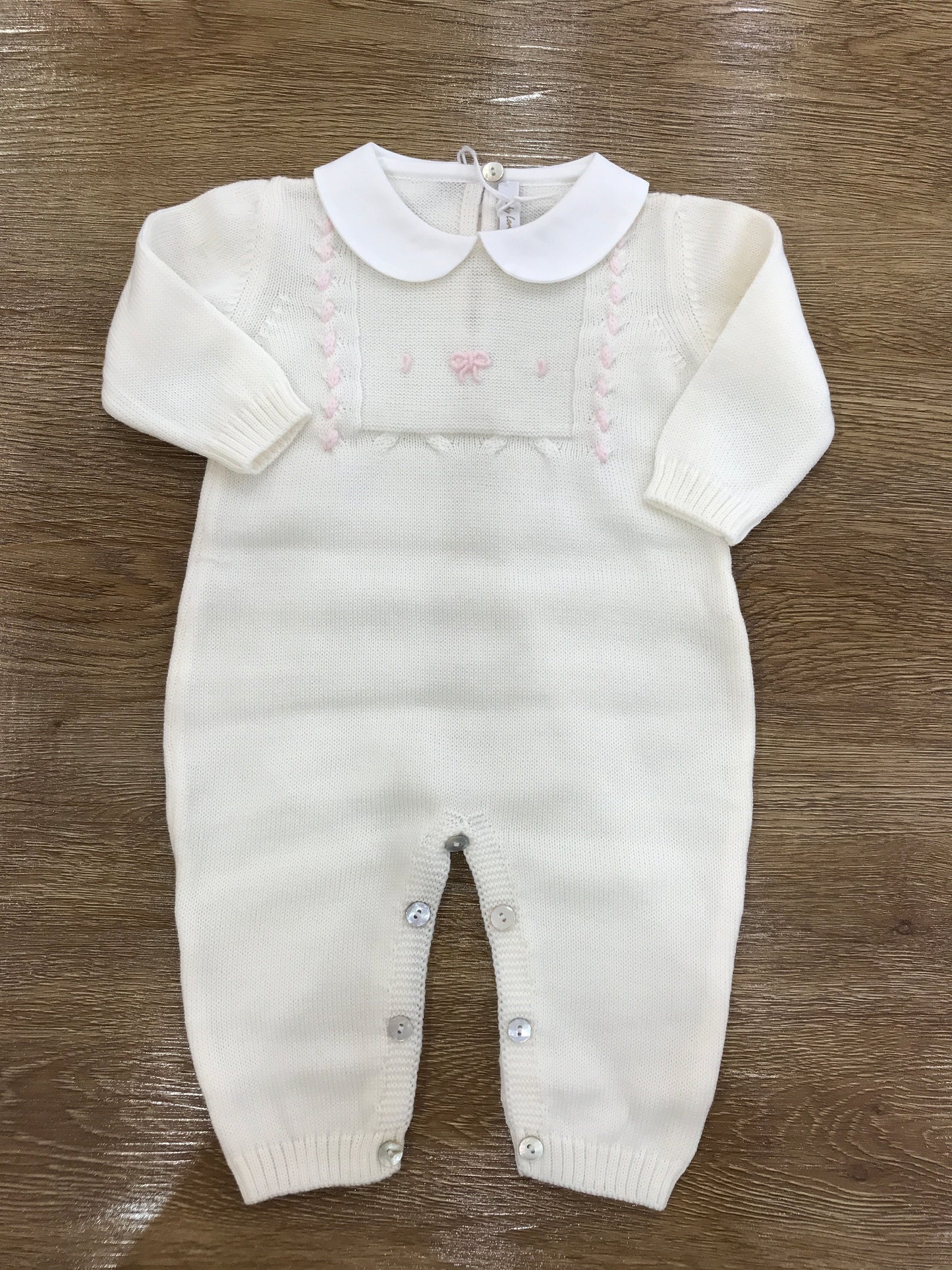 Tutina Baby Lord in lana panna con fiocchetto rosa ricamato