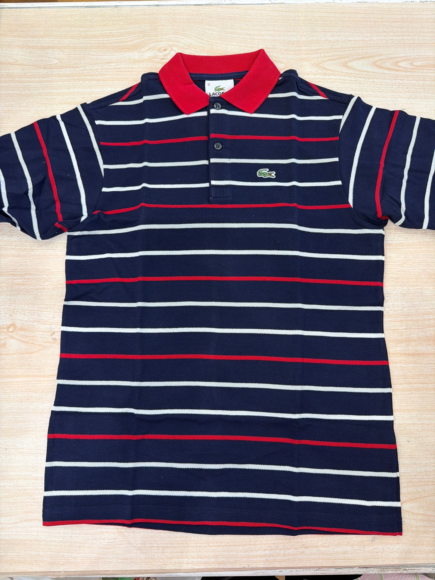 Polo Lacoste in cotone mezza manica con bottoncini e logo ricamato lateralmente unisex