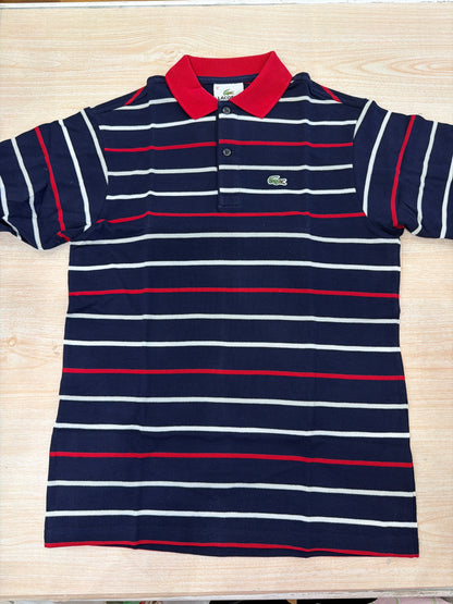 Polo Lacoste in cotone mezza manica con bottoncini e logo ricamato lateralmente unisex