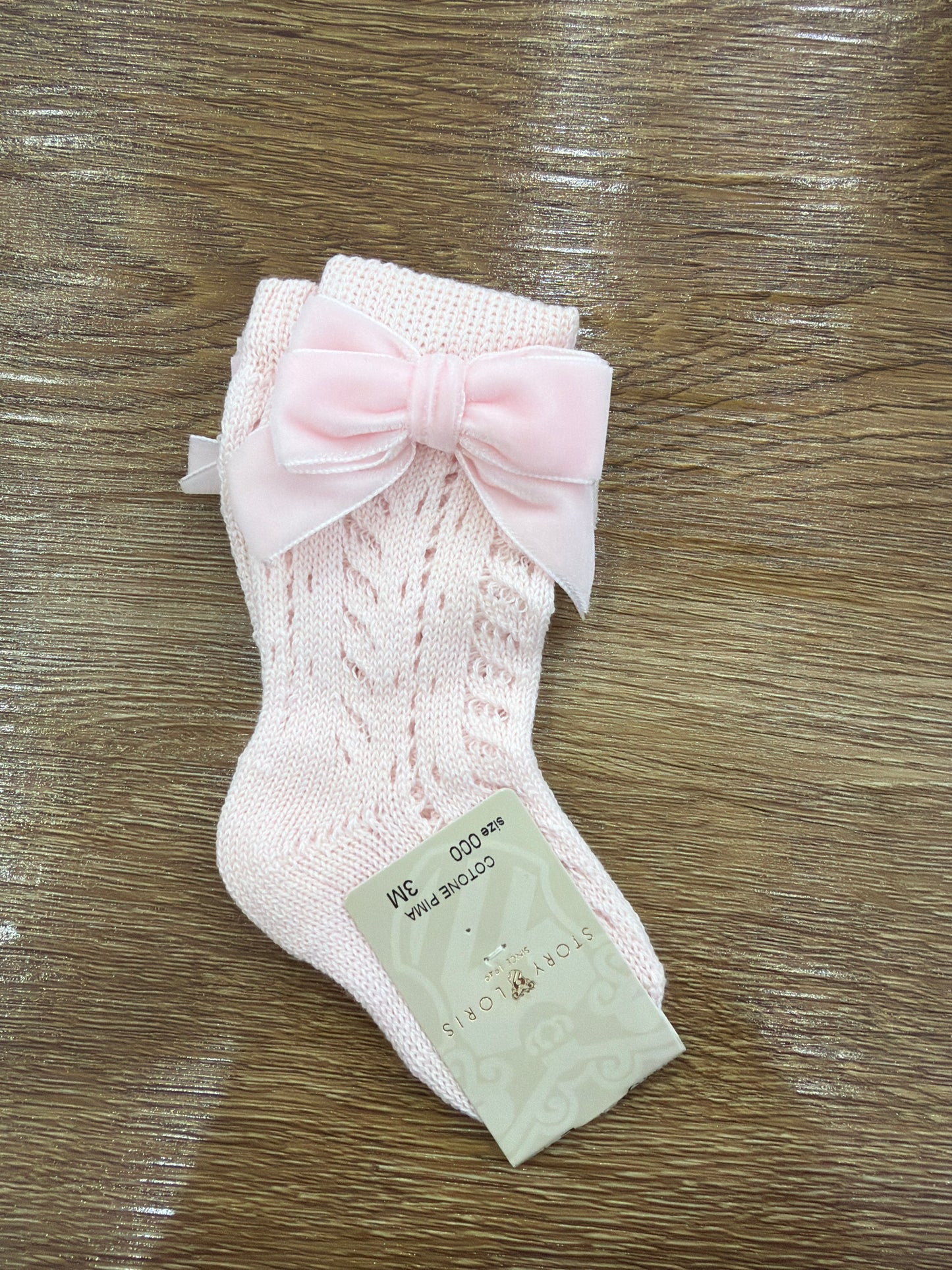 Calzini Story Loris in caldo cotone rosa con fiocco in velluto