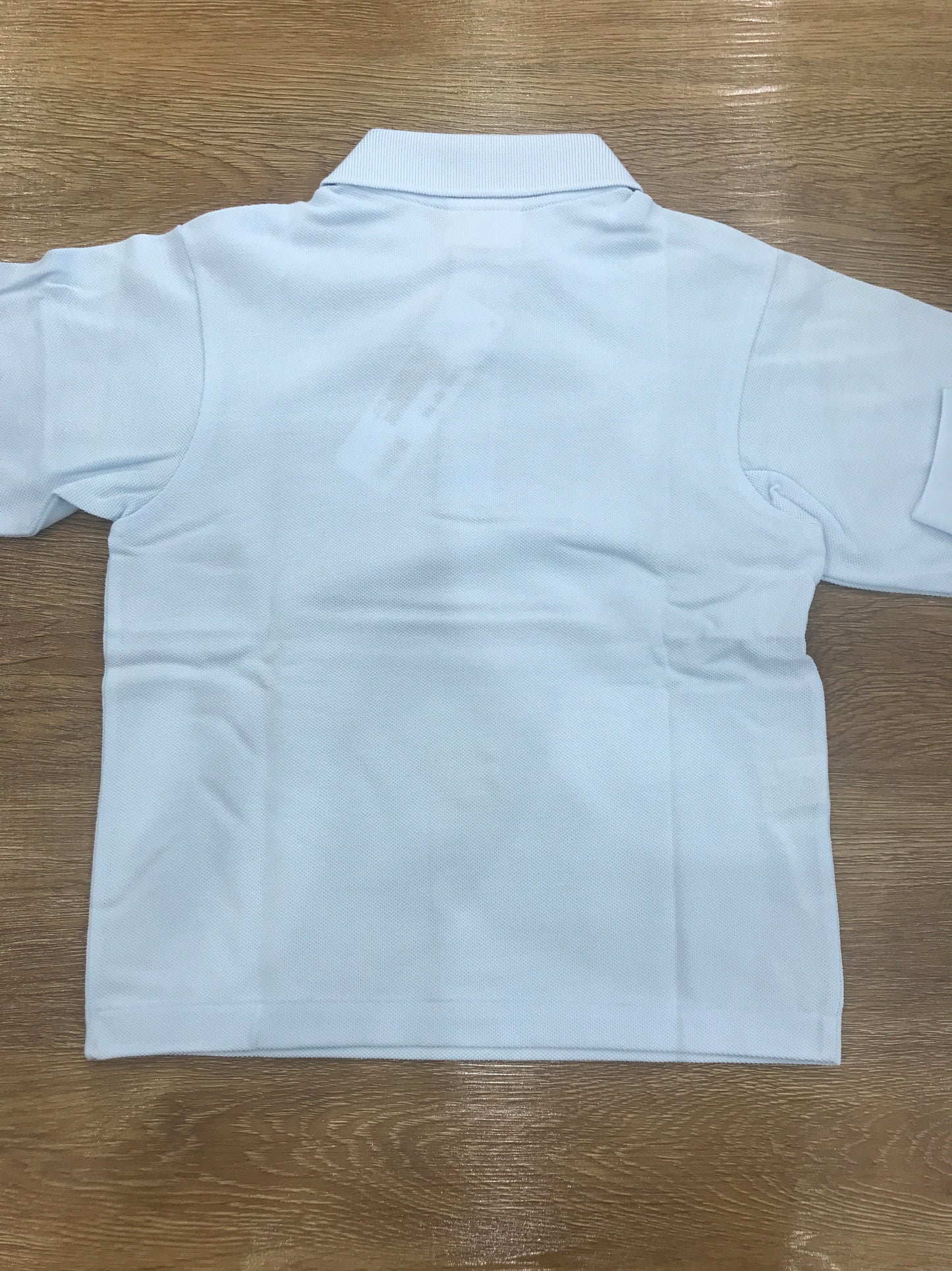 Polo Lacoste manica lunga con polsini e bottoncini