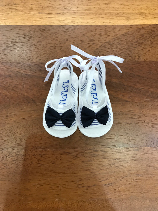 Sandalo Nanan a righe bianche e blu con fiocchetto sul davanti