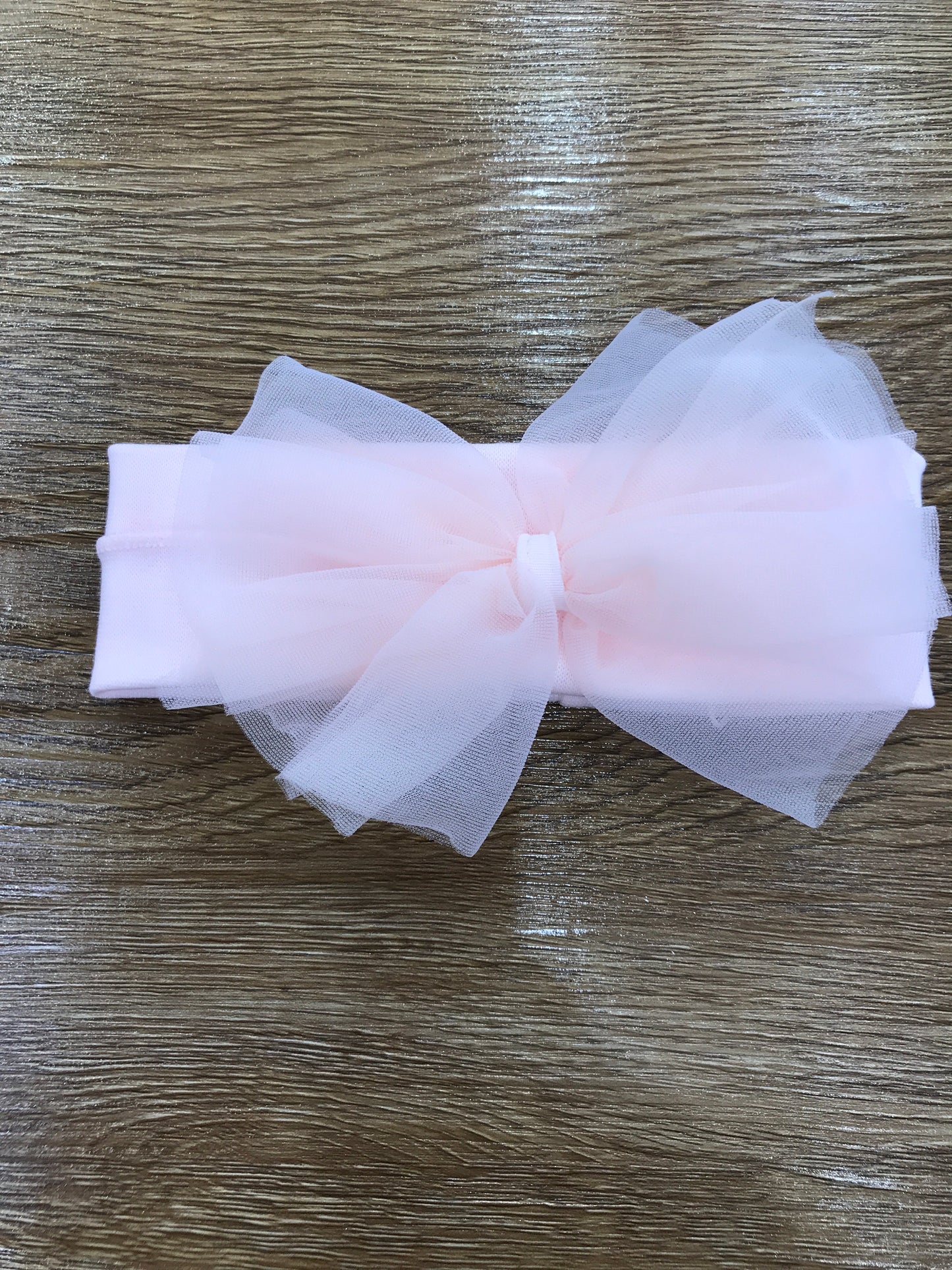 Fascia Sofija in caldo cotone rosa con fiocco in tulle