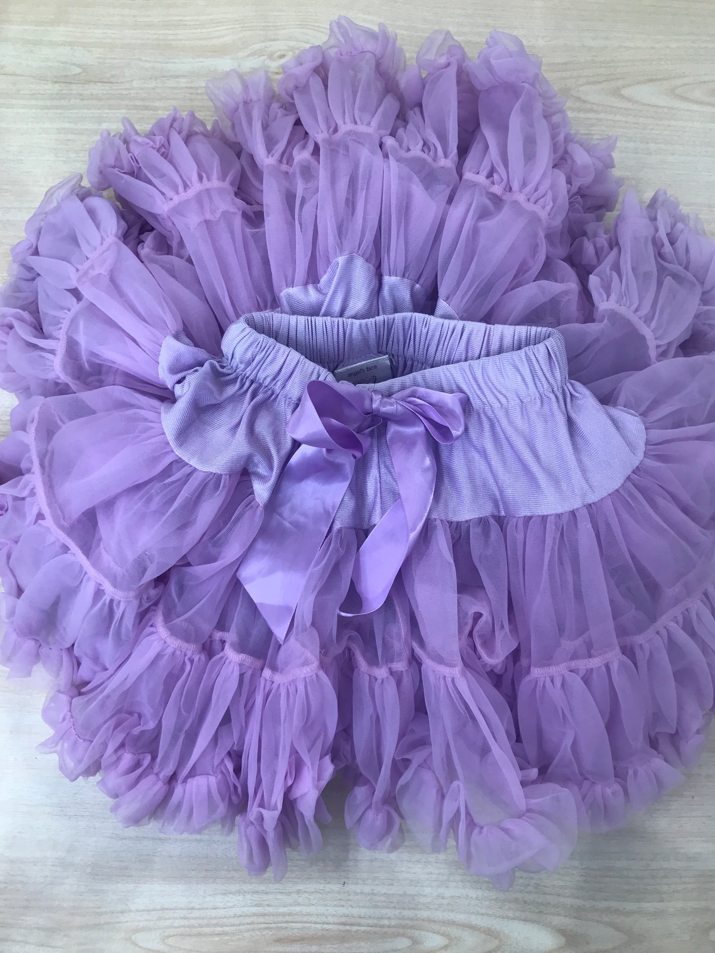 Gonna Angel's face in tulle viola con doppie balze e fiocco sul davanti
