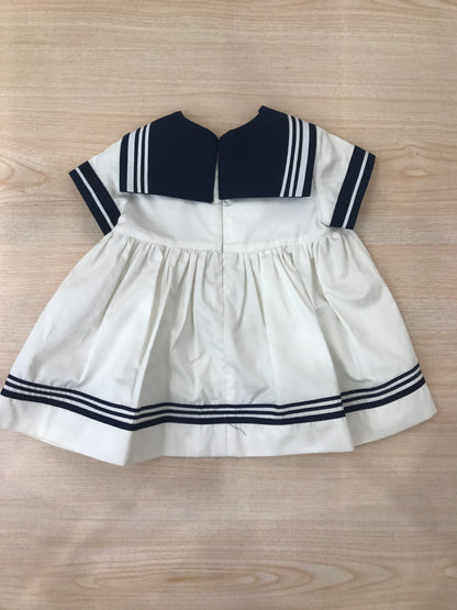 Abito Cielo Blu in cotone bianco e blu a righe stile marinaretto con fiocchetto sul davanti