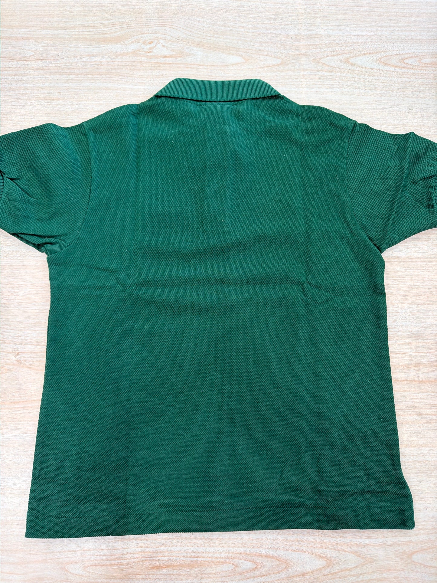 Polo Lacoste in cotone mezza manica con bottoncini e logo ricamato lateralmente unisex