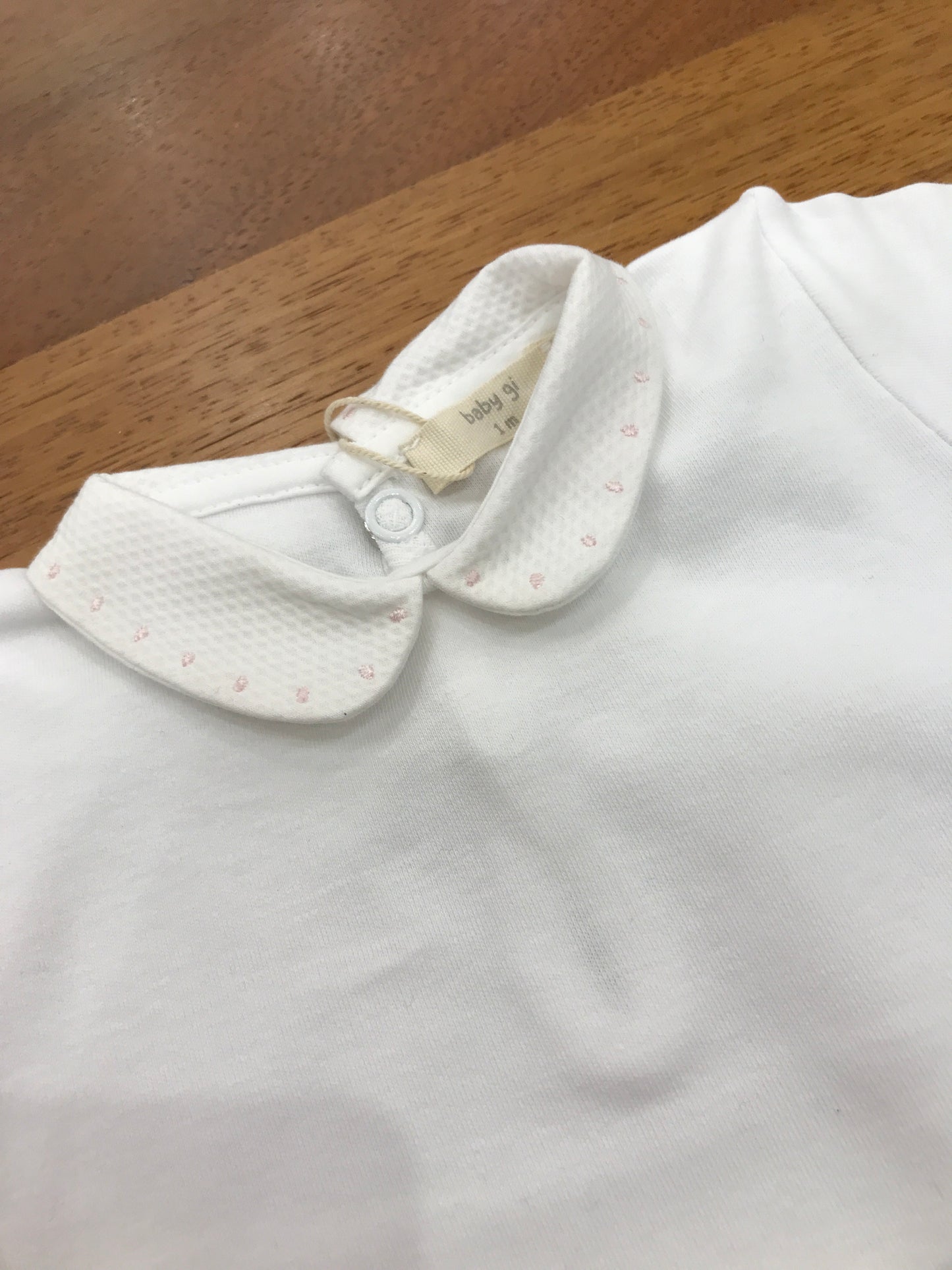 Body Baby Gi in cotone con collo con profilo con pois rosa mezza manica