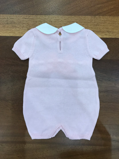 Pagliaccetto Baby Lord in filo mezza manica rosa collo tondo bianco con fiocchetto bianco sul davanti