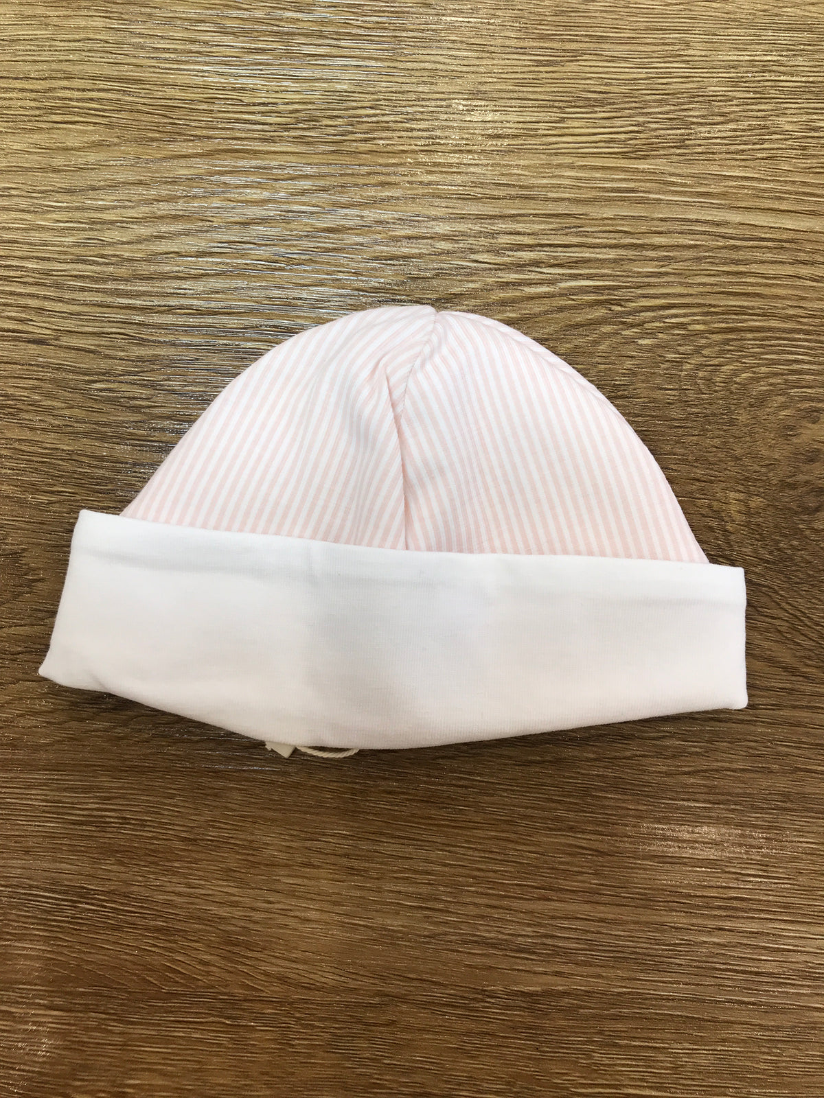 Cappello Laranjinha in cotone a righe bianche e rosa con risvolto bianco