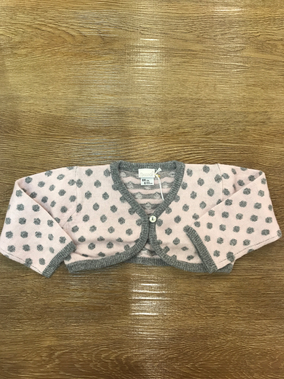 Cardigan Coccodè in lana rosa con pois in grigio