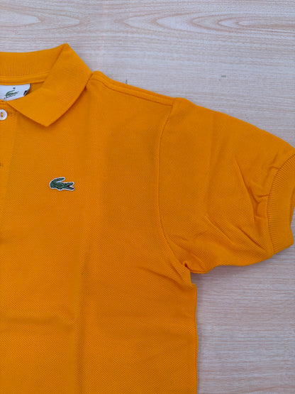 Polo Lacoste in cotone mezza manica con bottoncini e logo ricamato lateralmente unisex