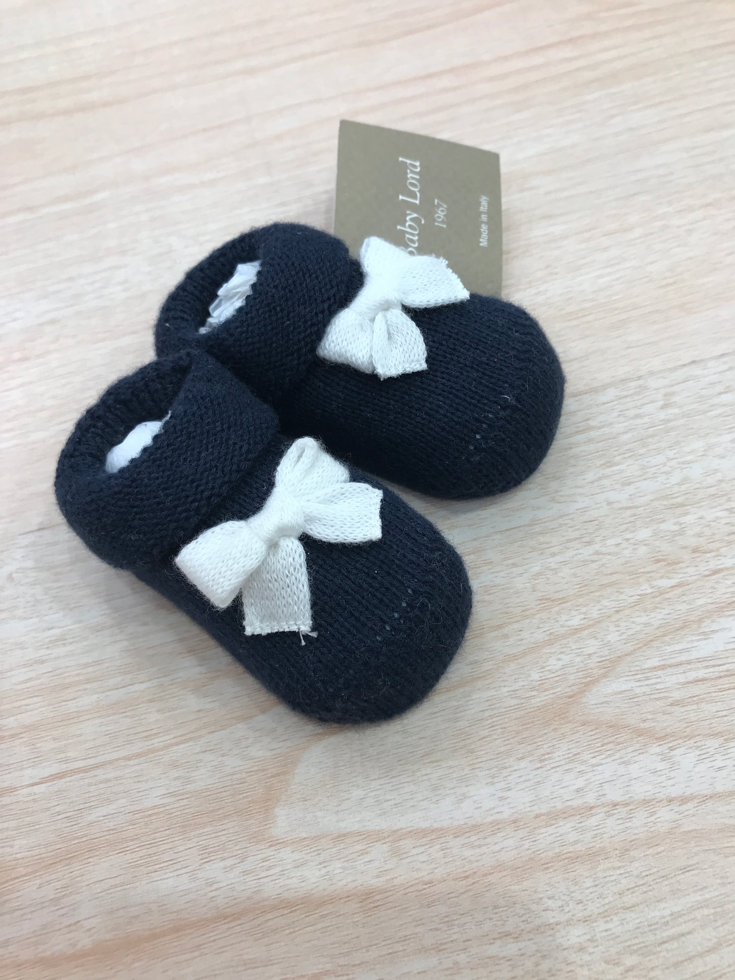 Babbucce Baby Lord in filo blu scuro con fiocchetto bianco