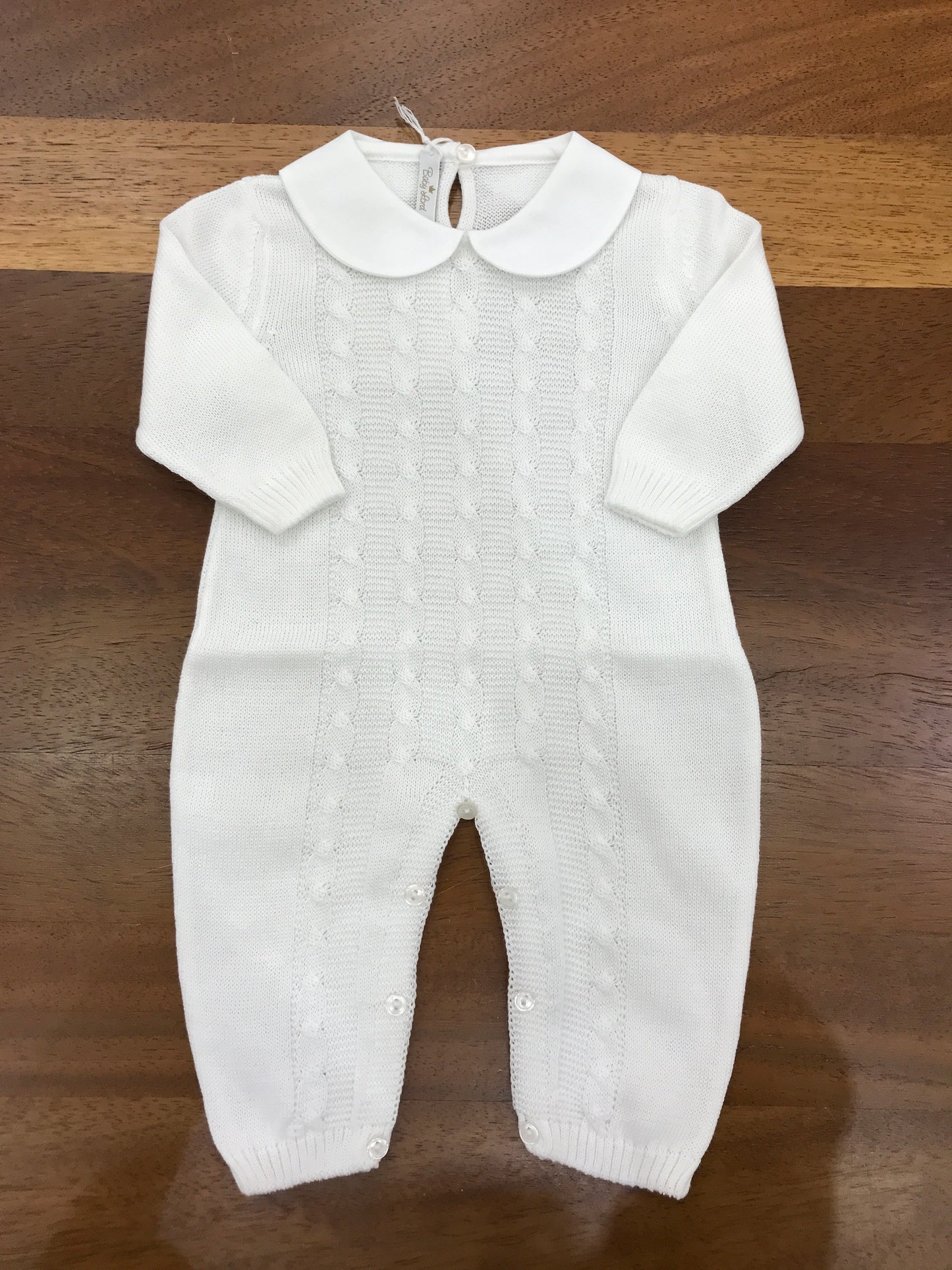 Tutina Baby Lord in filo bianca manica lunga con lavorazione di trecce con collo tondo