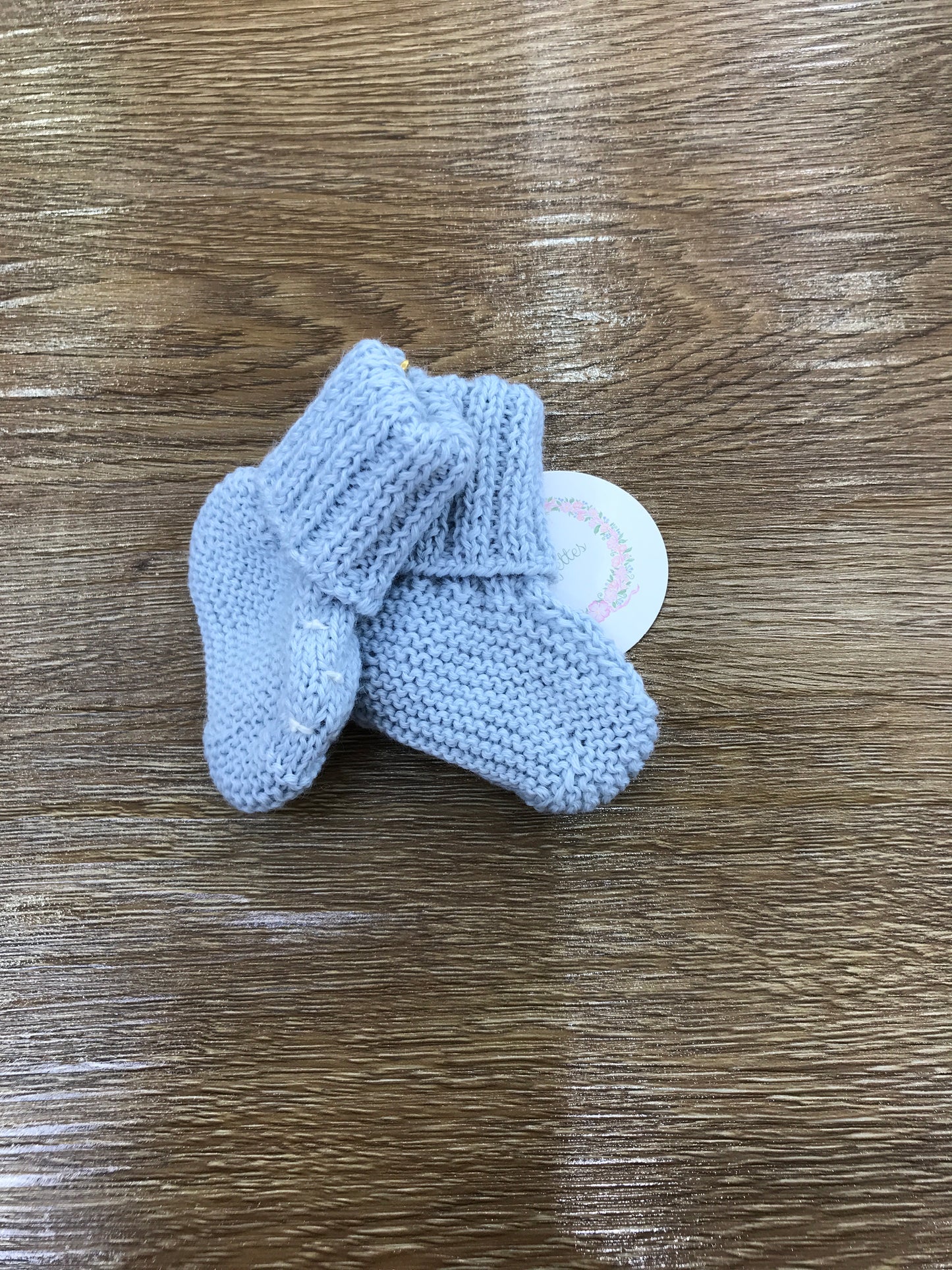 Babbucce Fofettes celesti con punto smock panna ricamato sul davanti
