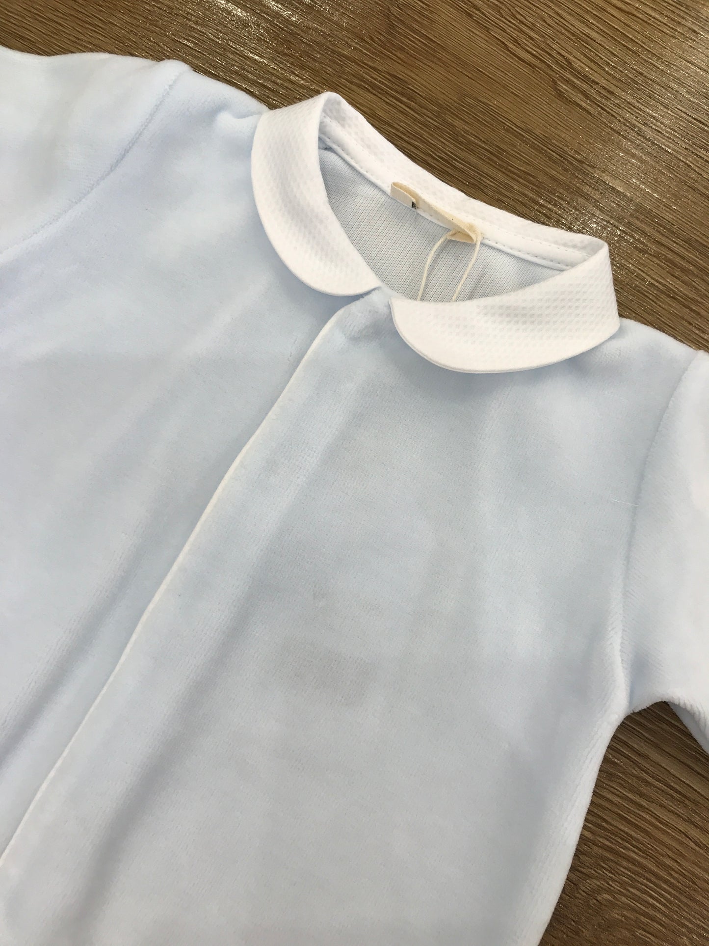 Tutina Baby Gi in ciniglia intera con ali bianche sul retro