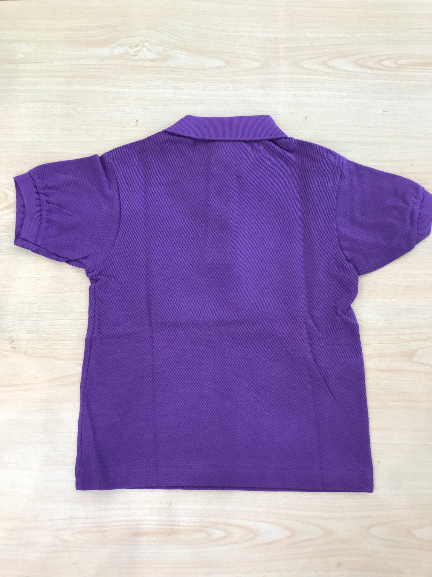Polo Lacoste in cotone mezza manica con bottoncini e logo ricamato lateralmente unisex