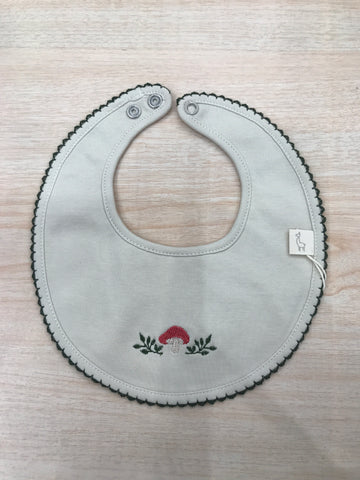 Bavetta Baby Gi in cotone rotonda ricamata ai bordi in verde ed al centro funghetto