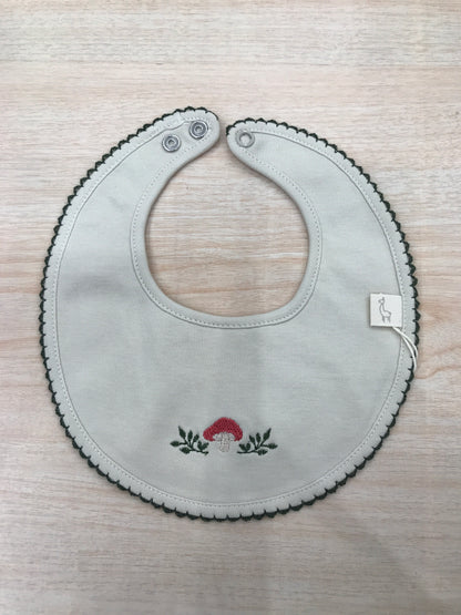Bavetta Baby Gi in cotone rotonda ricamata ai bordi in verde ed al centro funghetto