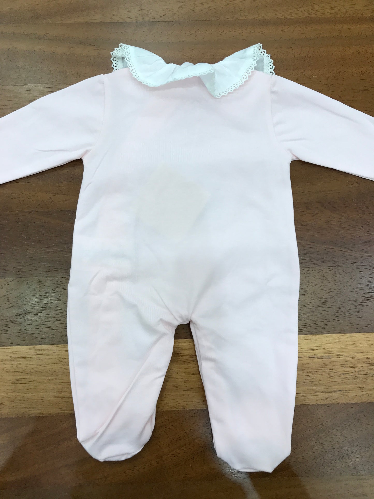 Tutina Nanan in cotone manica lunga con piedini collo con rusche bianca