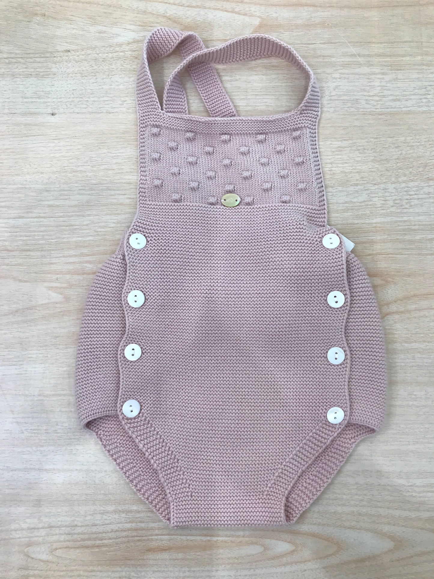 Pagliaccetto Martin Aranda in filo rosa antico con bretelle con corpetto con pois in rilievo