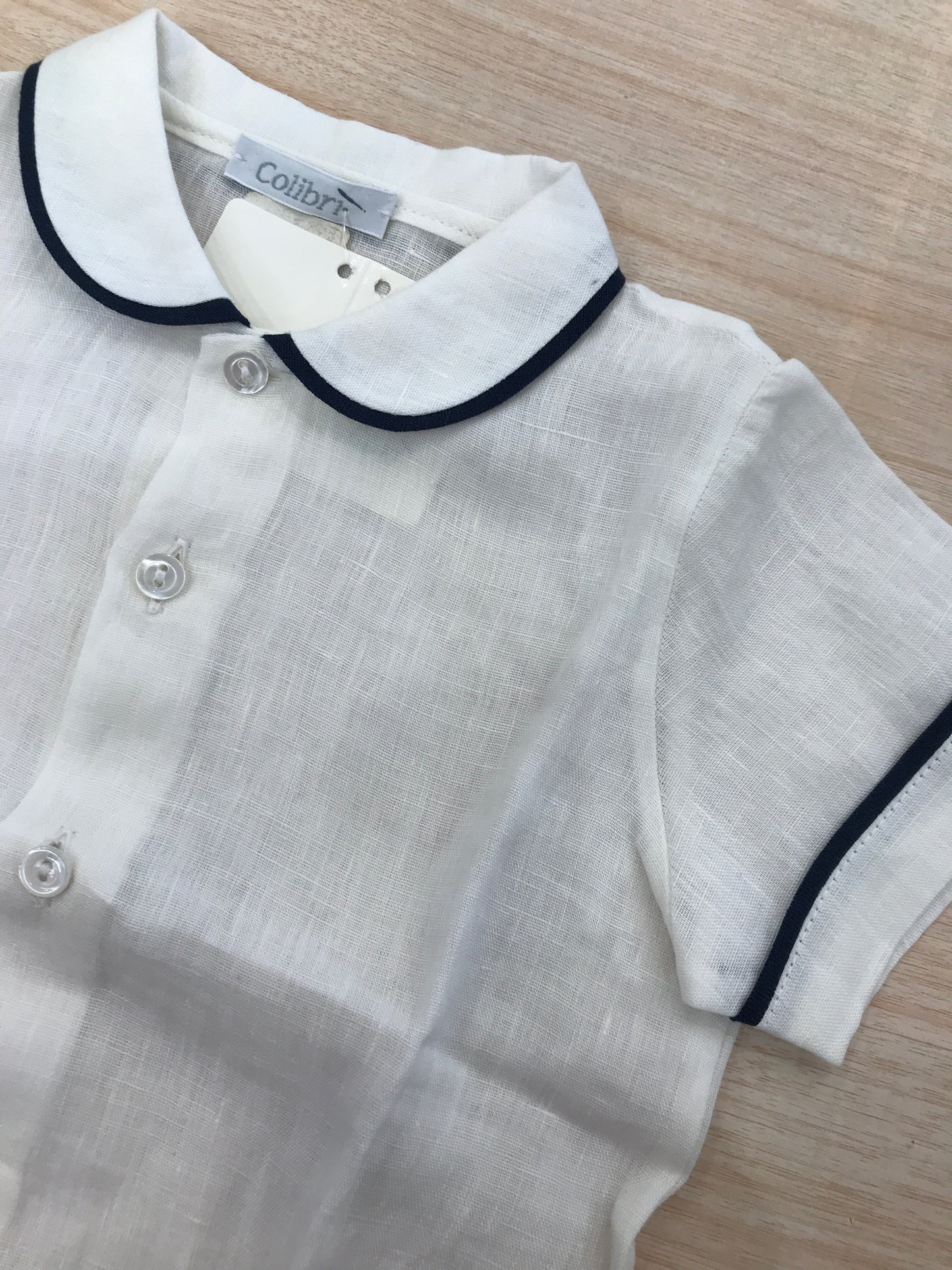 Camicia Colibrì in lino mezza manica con profilo blu scuro anche al colletto