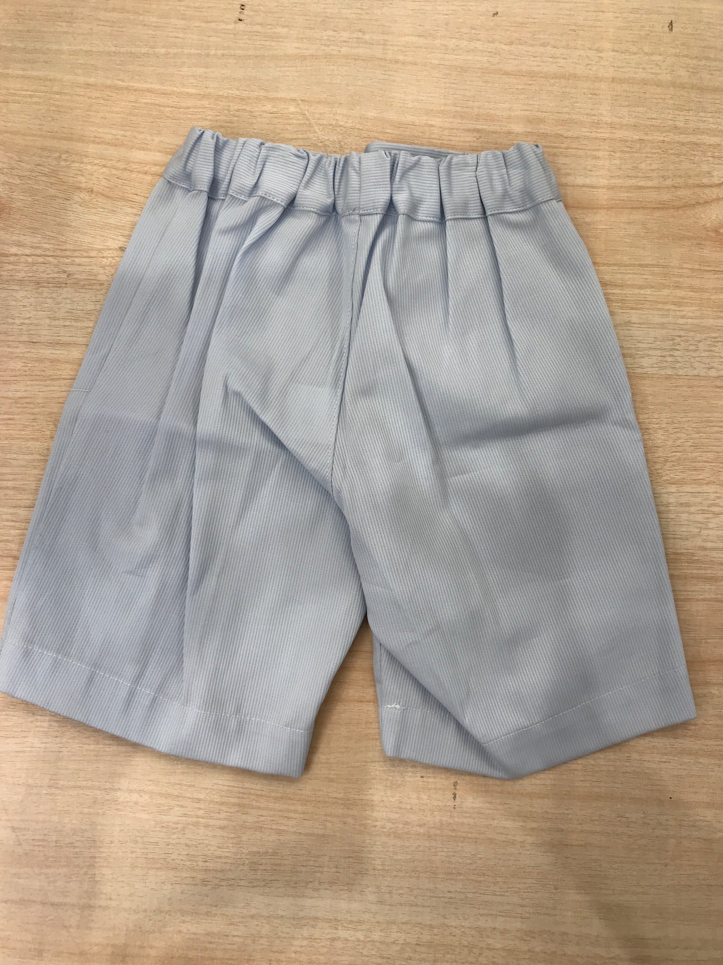 Pantalone Bebè di Almy in cotone celeste con elastico e bottoncini
