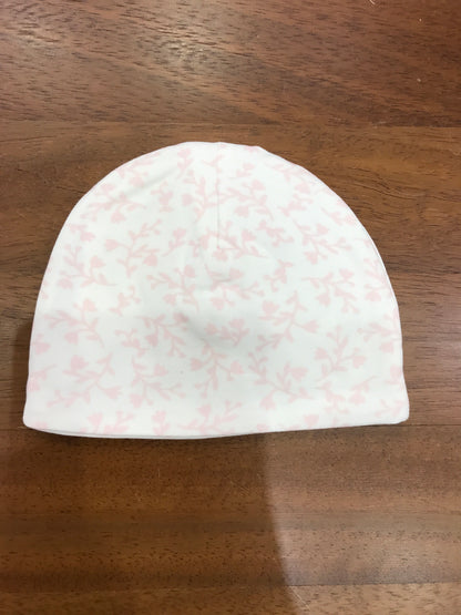 Cappello Le Bebè in cotone bianco con fiori rosa e fiocco centrale bianco sul davanti
