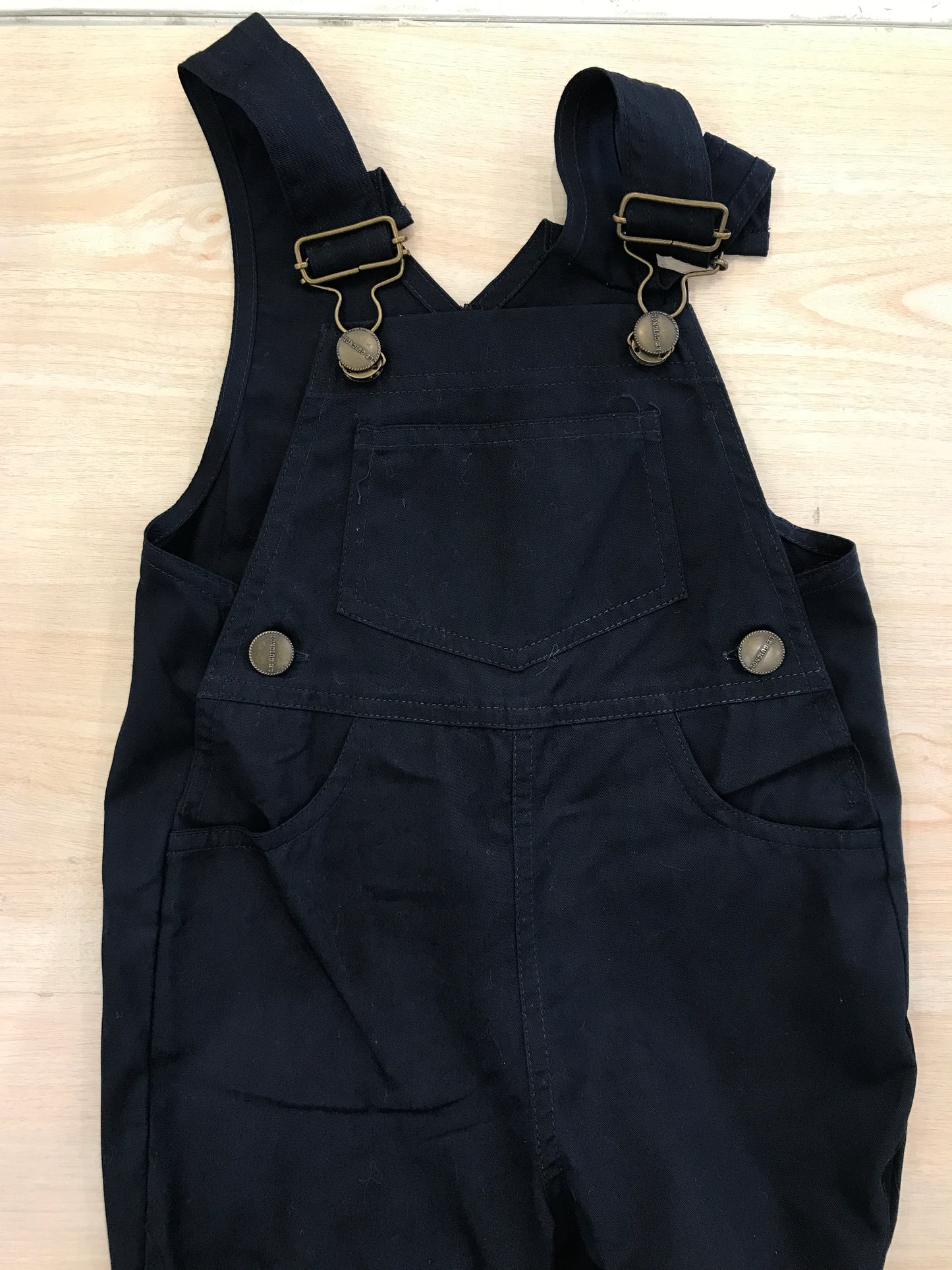 Salopette Le Guinol in cotone blu scuro con bretelle e tasca sul davanti