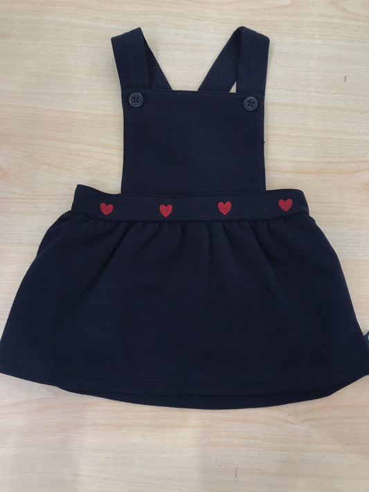 Salopette Petit Bateau blu scuro con bretelle regolabili con cuori ricamati rossi
