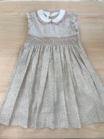 Abito Les Enfants de Gisele in cotone smanicato con rusche colletto bianco con rusche fantasia a fiorellini  con fascia lavorata da punto smock con rose ricamate