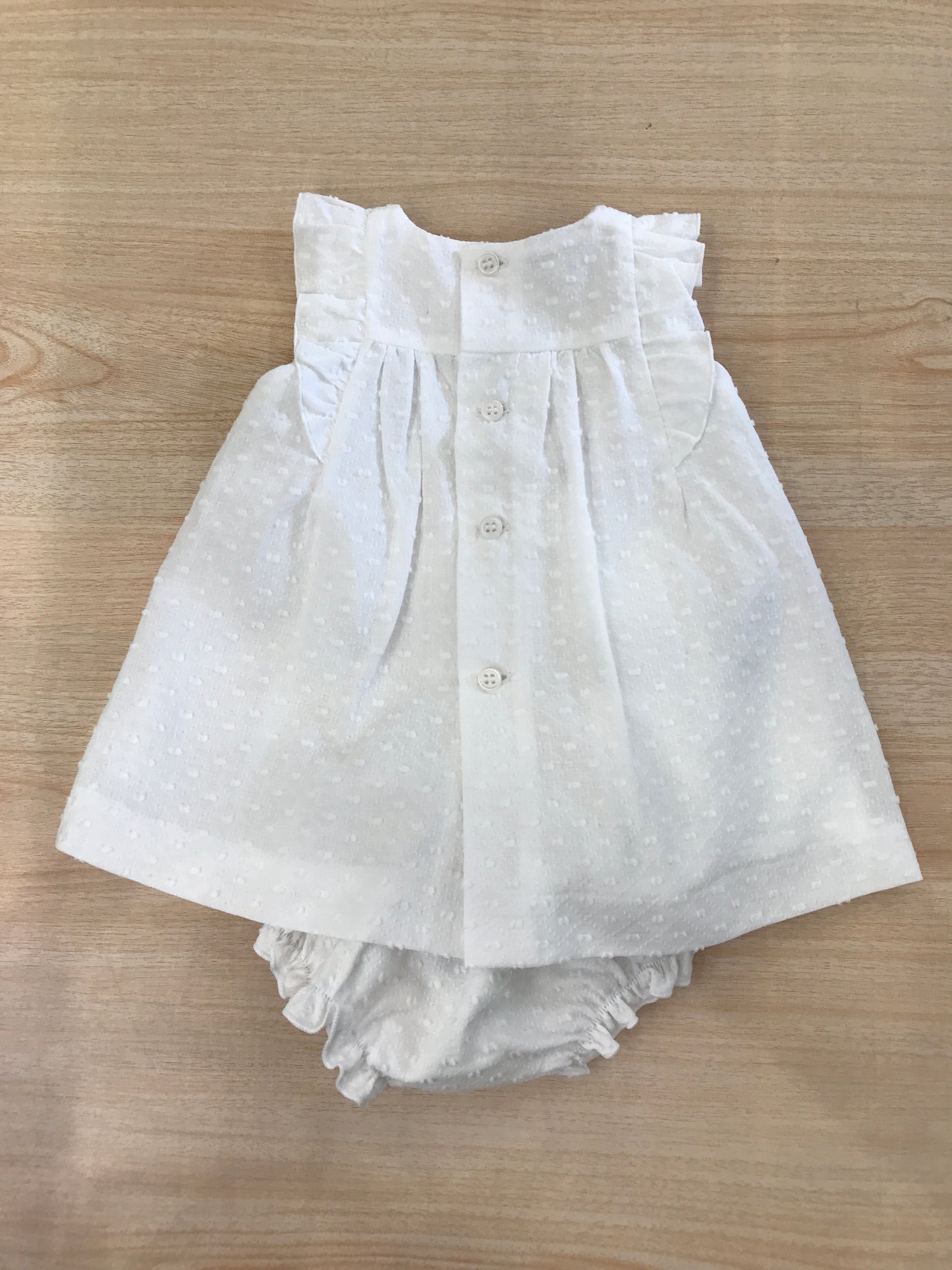 Completo Paz Rodriguez abitino bianco smanicato con corpetto lavorato da punto smock e culotte abbinata