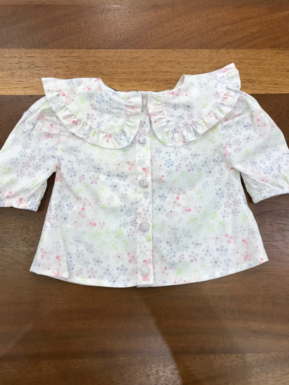Blusa a'lapage in cotone manica a tre quarti collo con rusche smerlata decorata da fiorellini