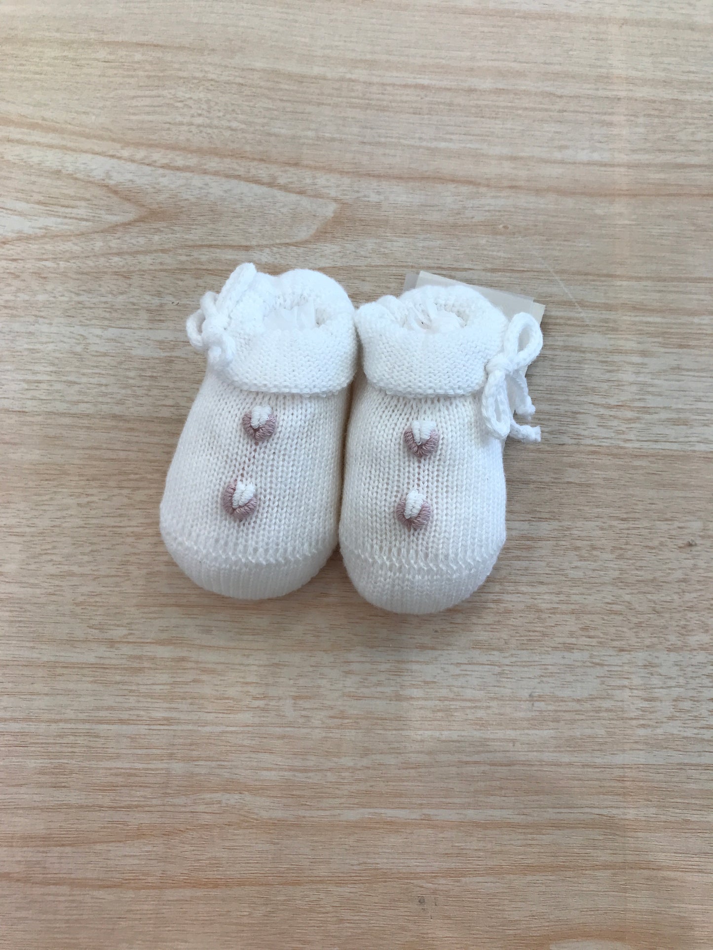 Babbucce Baby Lord in filo bianco con roselline e fiocchetti