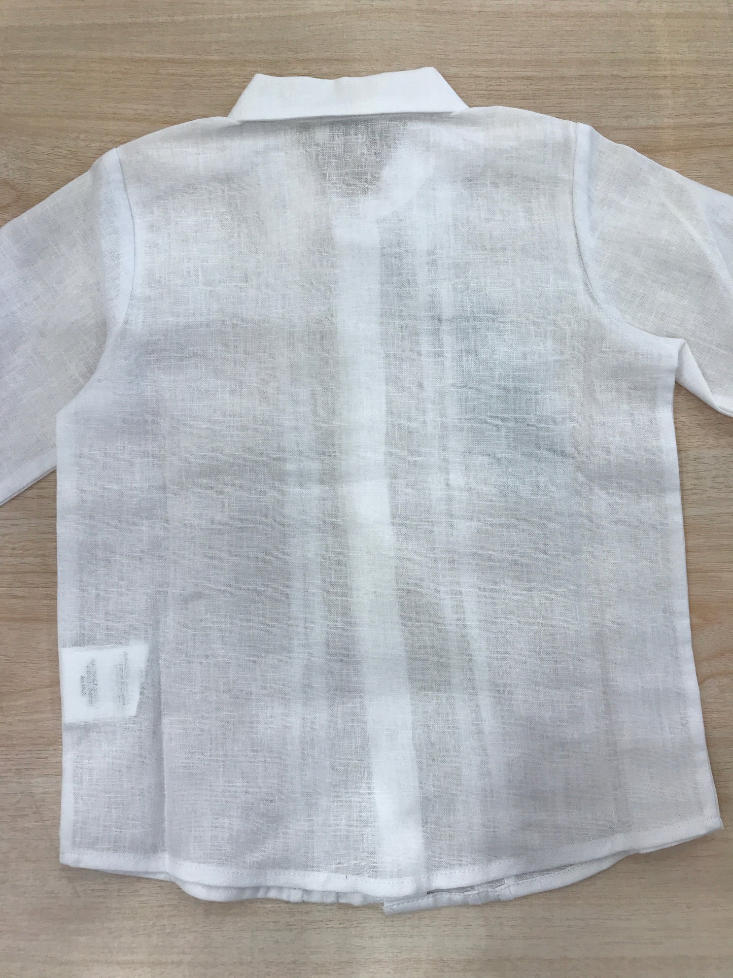 Camicia Jo Milano in lino bianco manica lunga con pieghe sul davanti e bottoncini madreperla