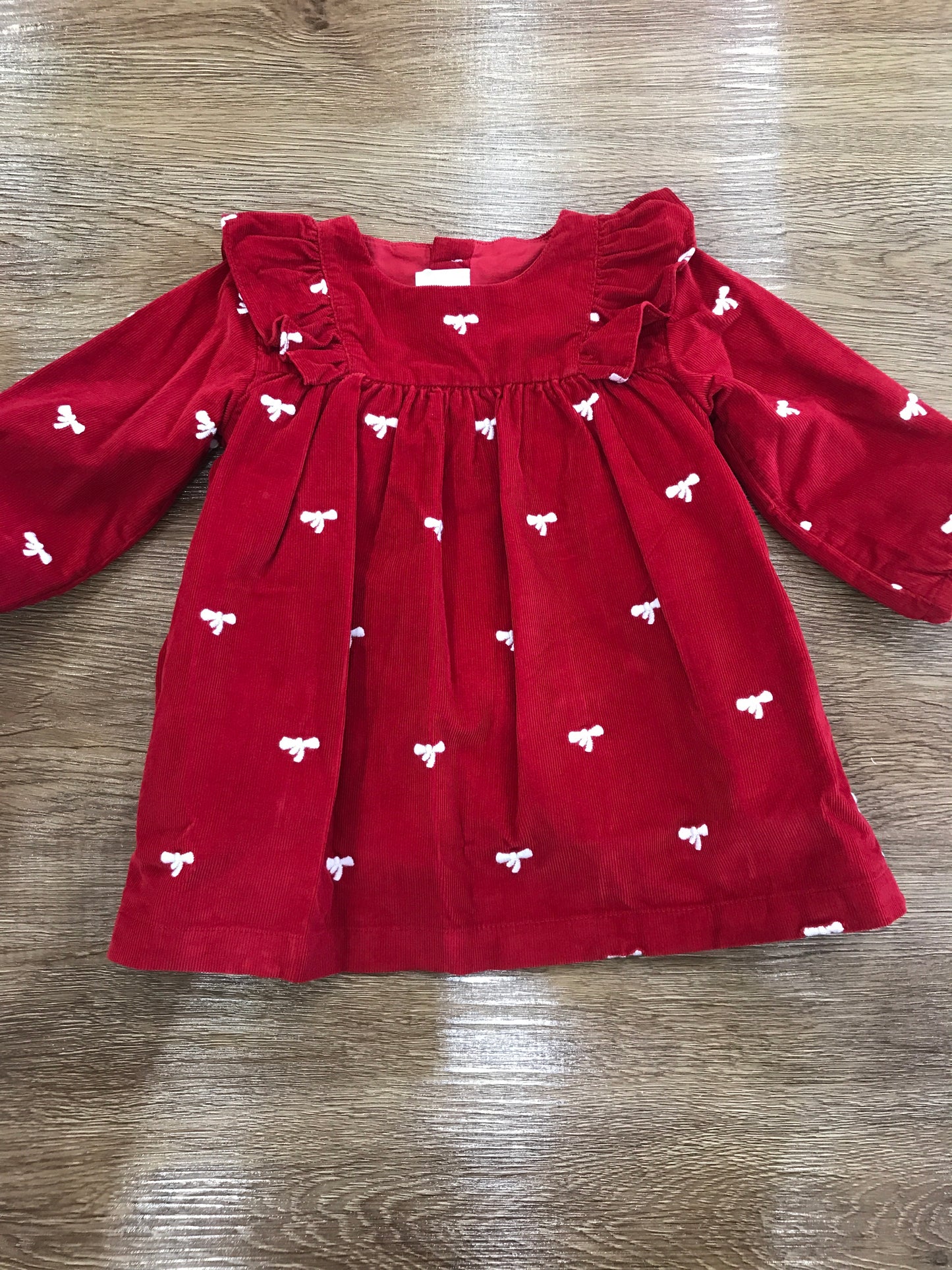 Abito Petit Bateau manica lunga a coste rosso con manica a sbuffo con rusche e piccoli fiocchetti ricamati bianchi