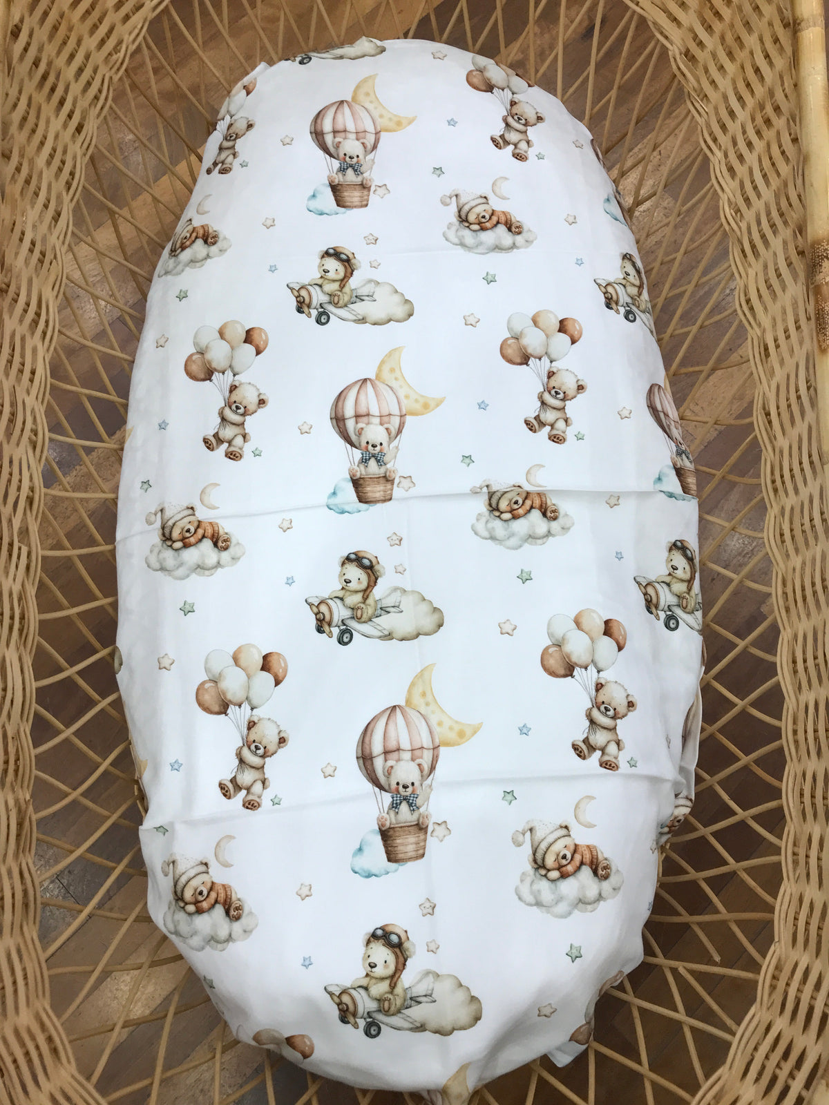 Mussola Nannafrufrù in cotone di bamboo di fondo panna con orsetti nei toni neutri con palloni e nuvolette