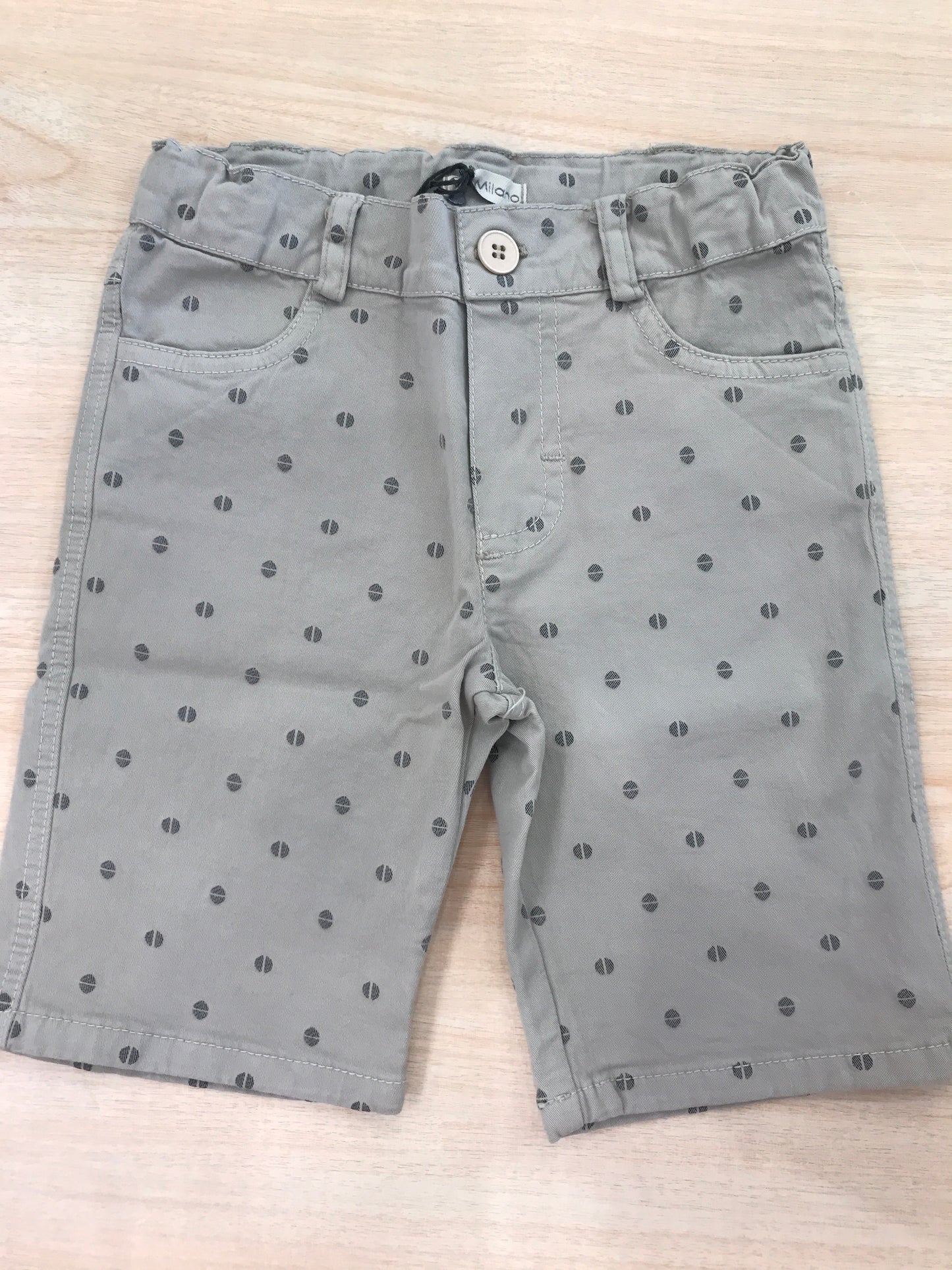 Pantalone Jo Milano tortora con tasche sul davanti e sul retro con piccoli pois su tutt'esso
