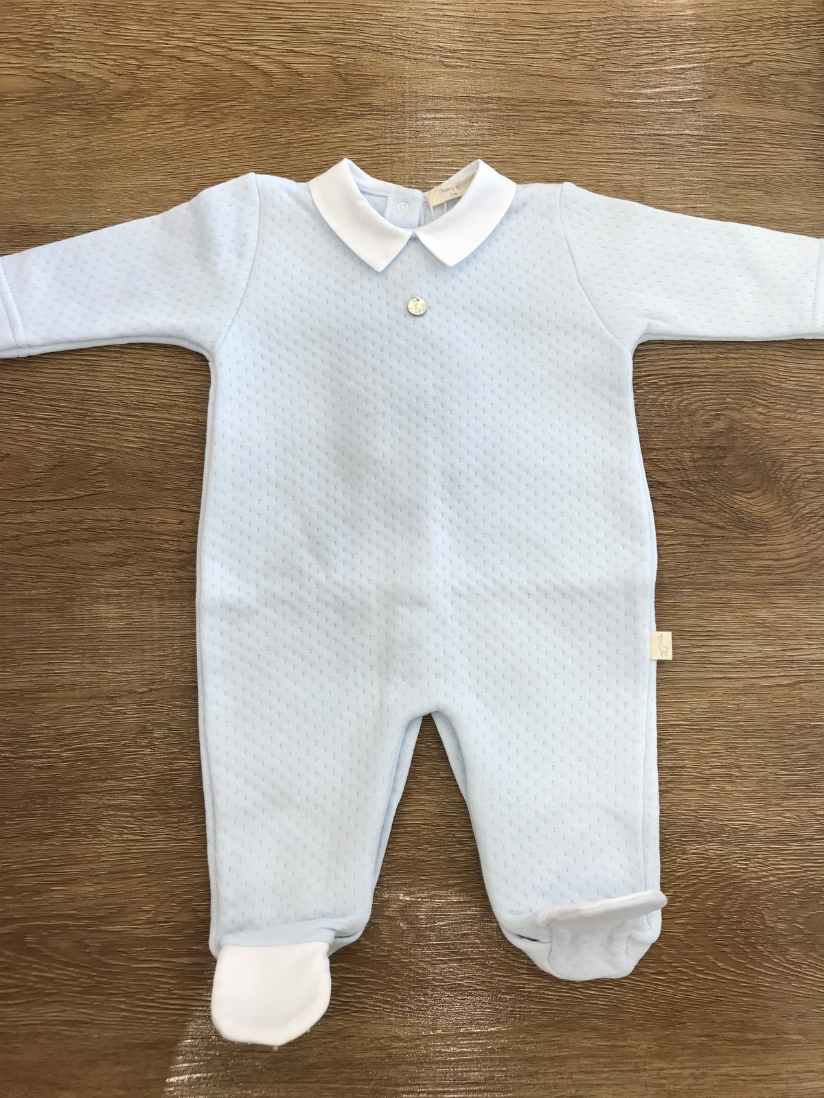 Tutina Baby Gi in ciniglia trapuntata intera con piedini e colletto bianco