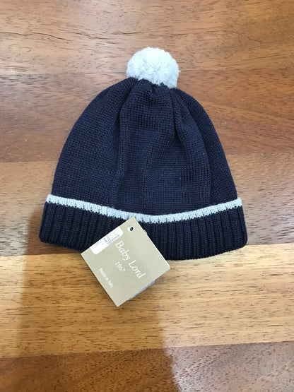 Cappello Baby Lord in lana blu con pon pon grigio sul centro capo