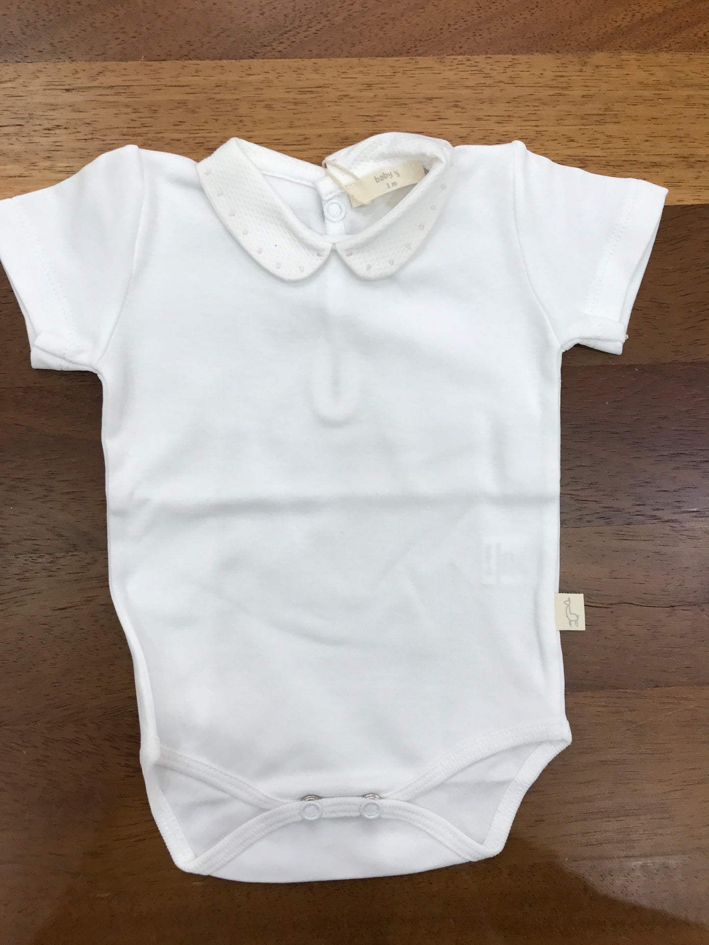 Body Baby Gi in cotone con collo con profilo con pois rosa mezza manica
