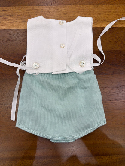 Pagliaccetto Paz Rodriguez in filo bianco e verde acqua smanicato la con lavorazione a maglia di pois con lacci laterali in bianco per fiocchi