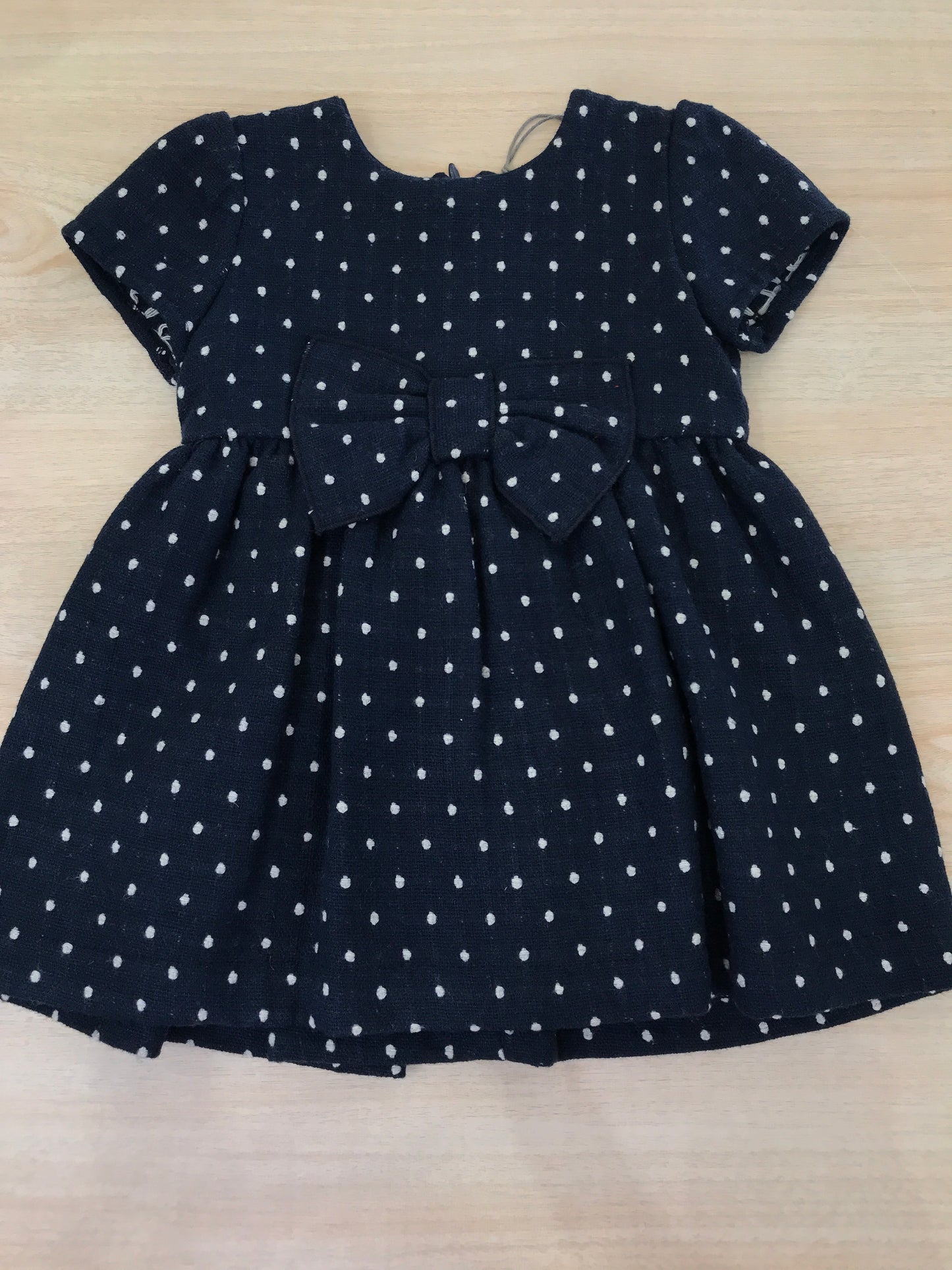 Abito Jo Milano in cotone blu scuro con pois bianchi mezza manica con fiocco al centro