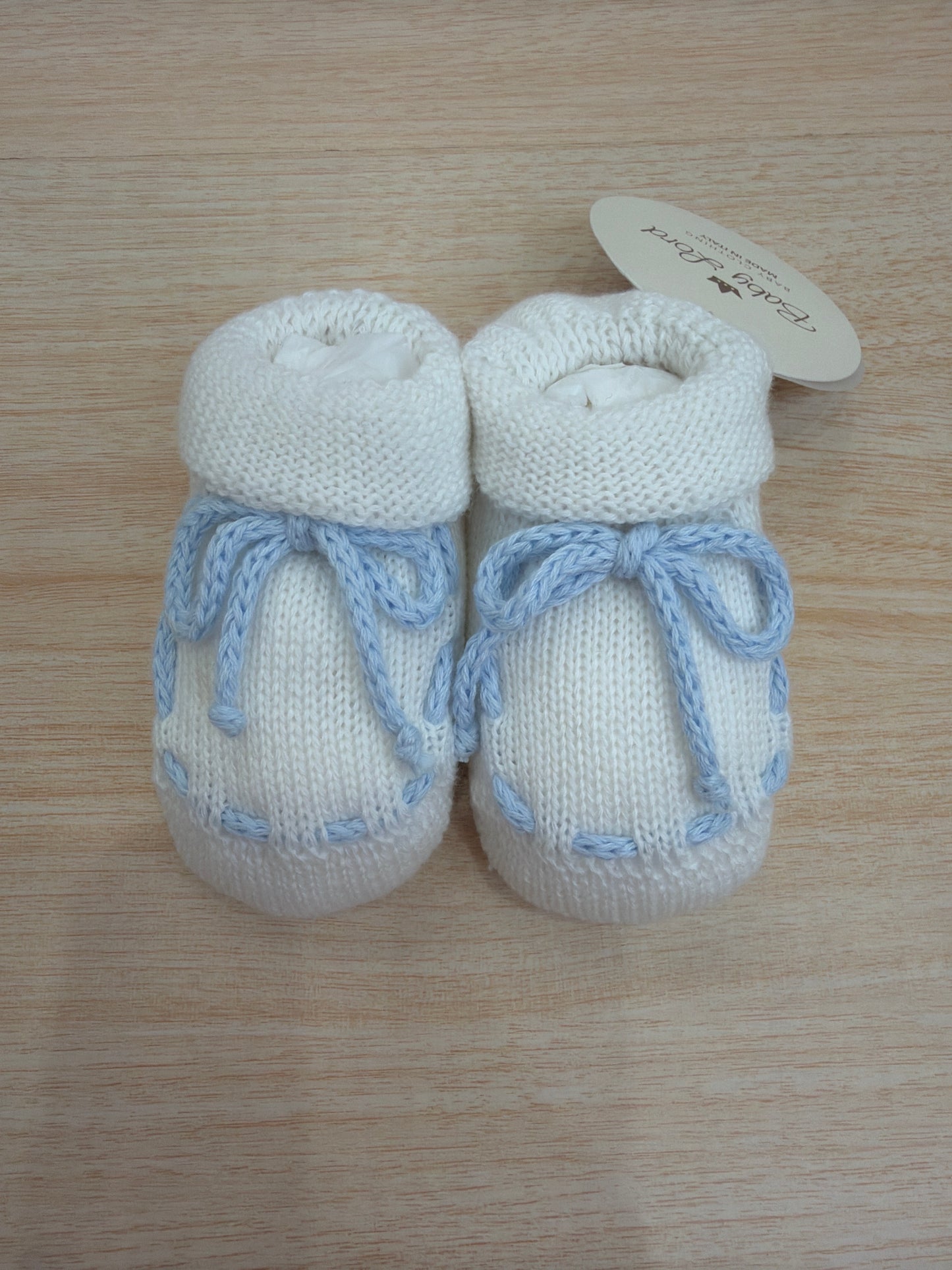 Babbucce Baby Lord in filo bianco con laccetto e fiocco in celeste