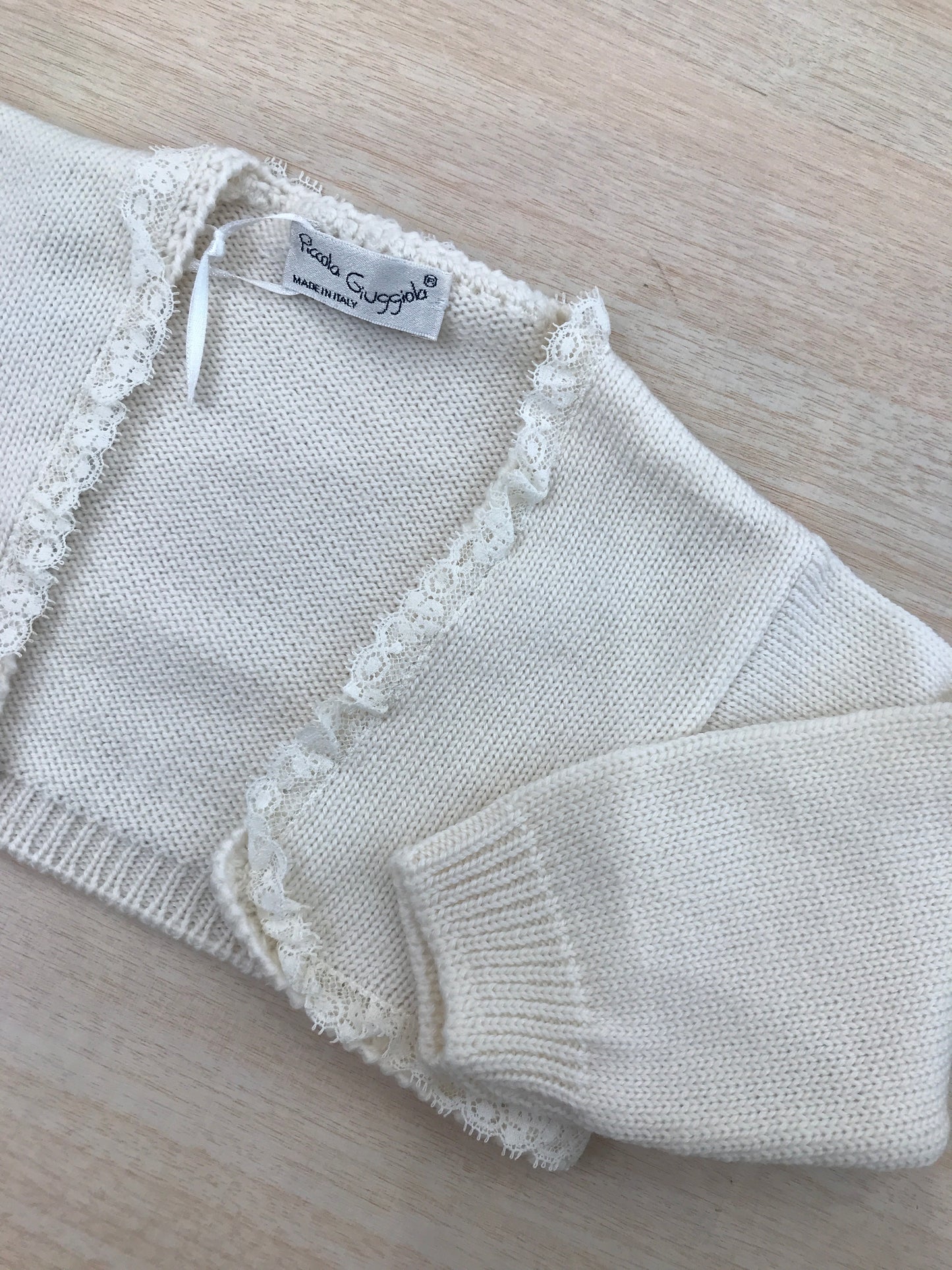 Cardigan Piccola Giuggiola in lana panna con valancienne al bordo