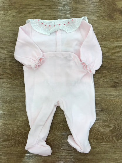 Tutina Petit Bateau in ciniglia rosa intera con collo con rusche e pois