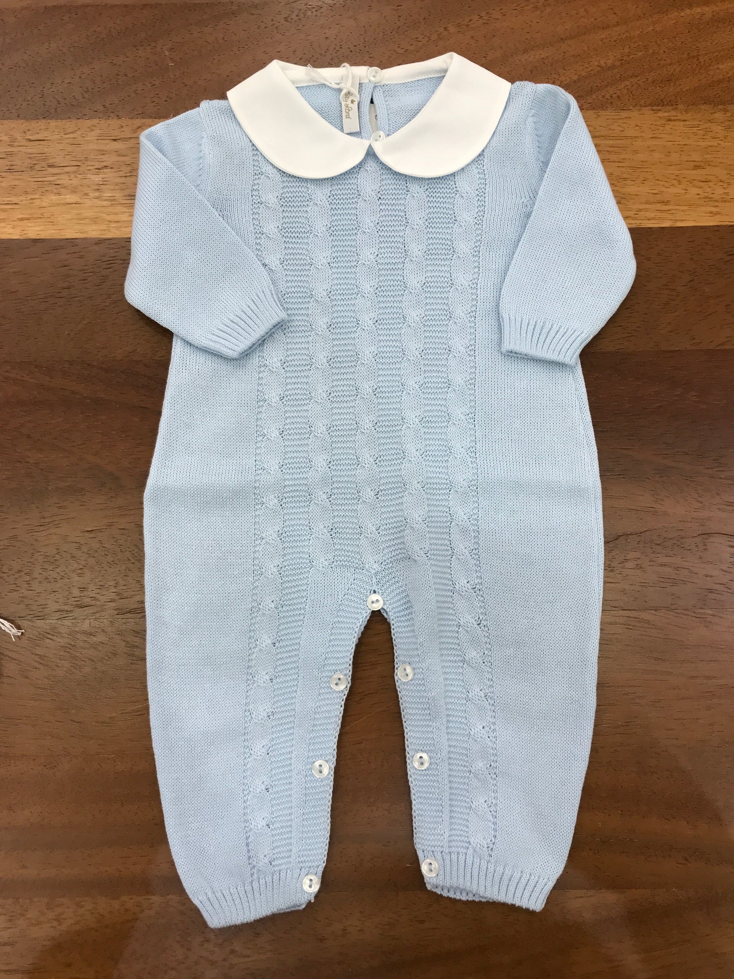 Tutina Baby Lord in filo manica lunga con lavorazione di trecce sul davanti collo tondo bianco